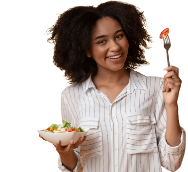 young woman holding a delicious salad bowl